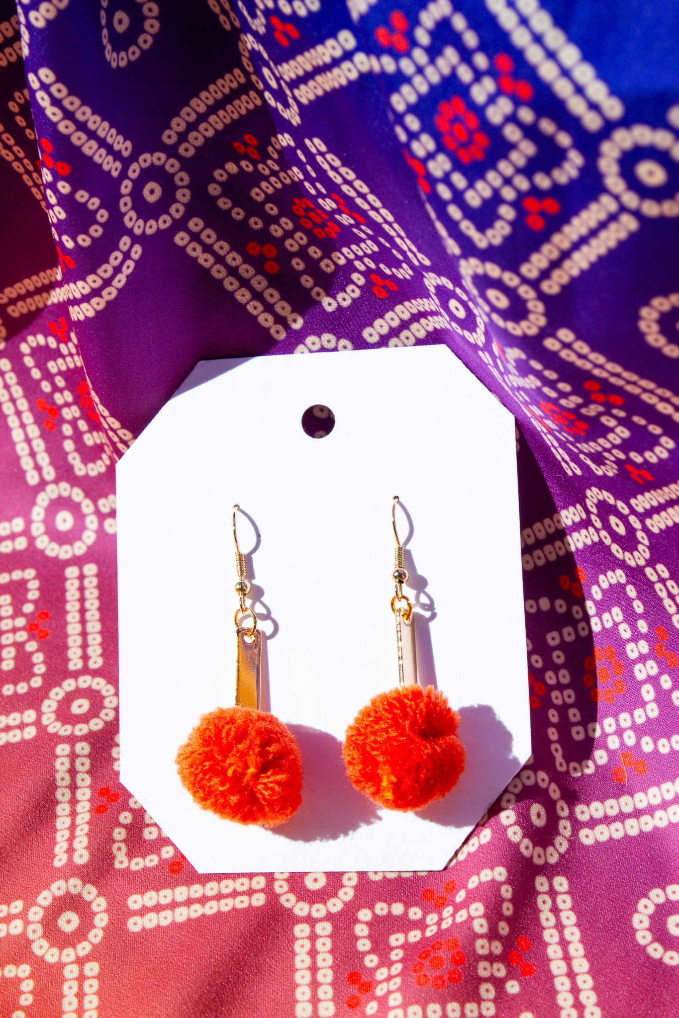 Orange Pom Pom Earrings