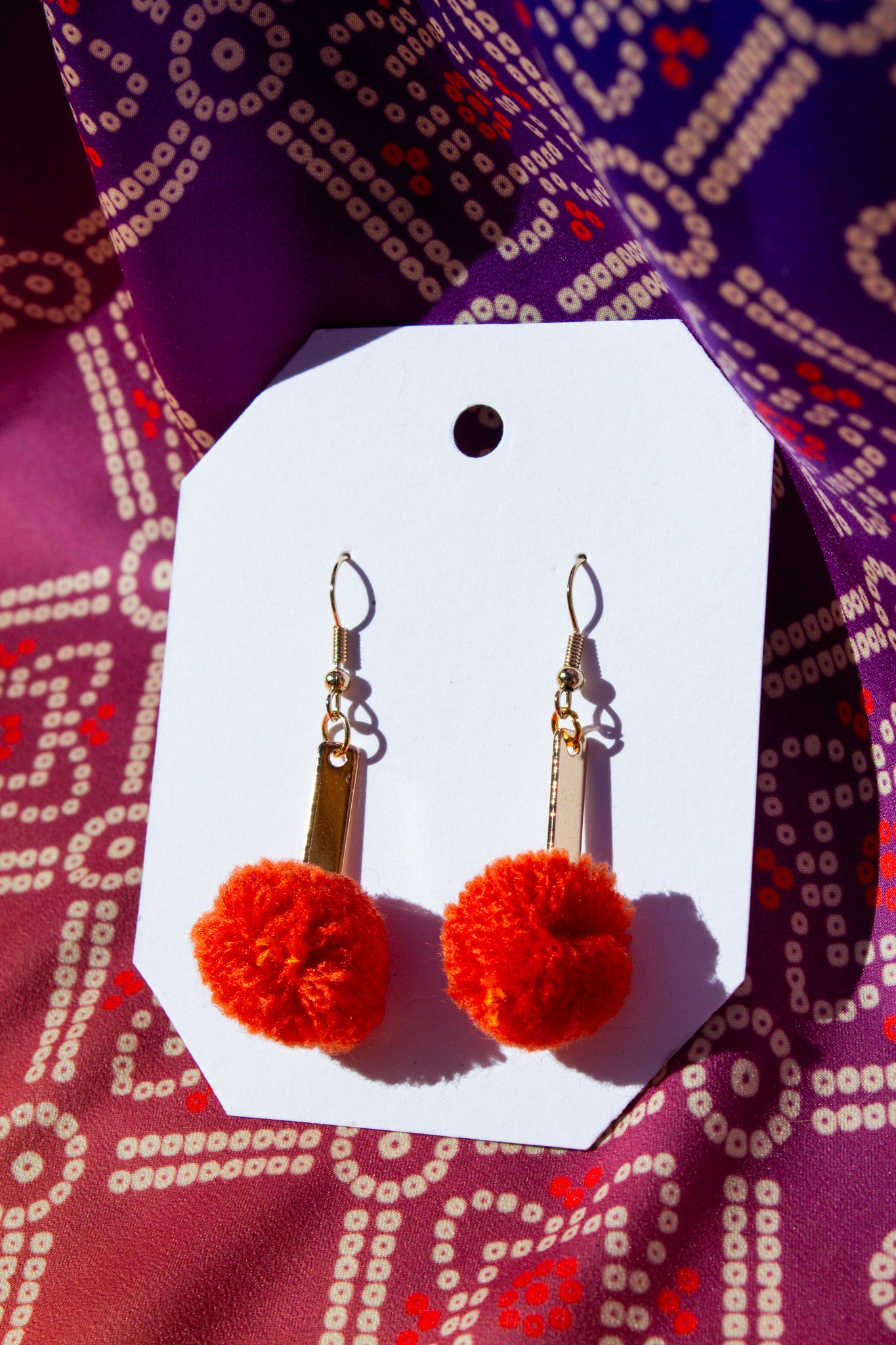 Orange Pom Pom Earrings